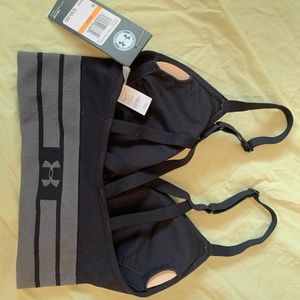 New sports bra. Never been worn. Soft. Stretchy. Padded cups can be removed.